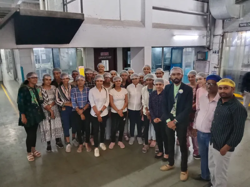 Cosmos students visiting Parle-G factory for food industry learning